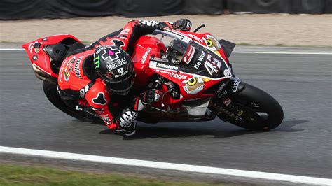 josh brookes does the double at oulton park to claim the panigale v4 r s maiden bsb win tommy