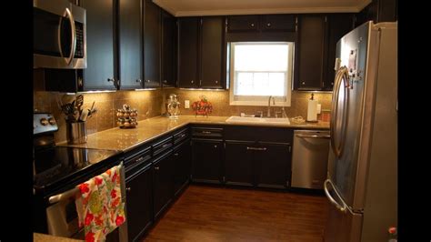 I decided to try valspar stainblocking bonding primer. Painting Kitchen Cabinets | Painting Kitchen Cabinets a ...