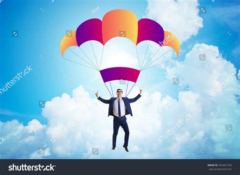 Young Businessman Falling On Parachute Business Stock Photo 764051539