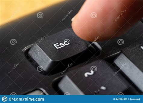 Finger Pushing Esc Key Black Keyboard Stock Photos Free And Royalty