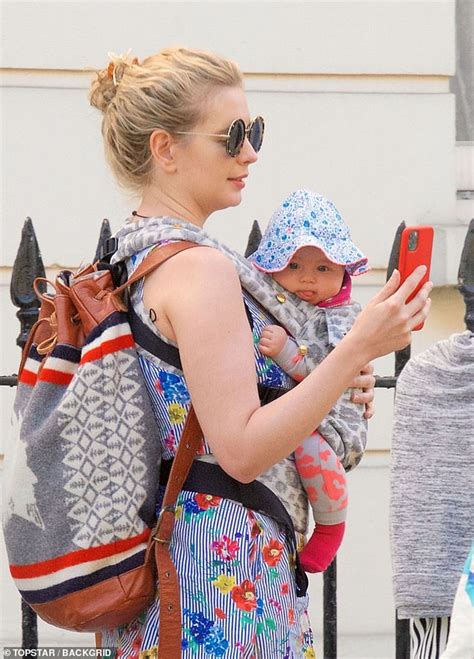 The countdown star is expecting her second child. Rachel Riley cradles baby Maven on sunny stroll amid legal ...