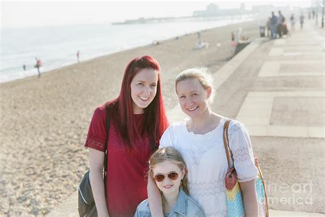 Portrait Lesbian Couple And Daughter Photograph By Caia Imagescience