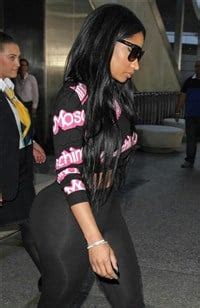 Nicki Minaj Smuggles Her Ass Out Of An Airport In See Thru Tights