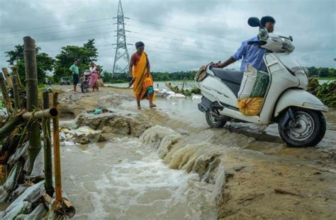Photos Floods Wreak Havoc Across Several States Lakhs Affected