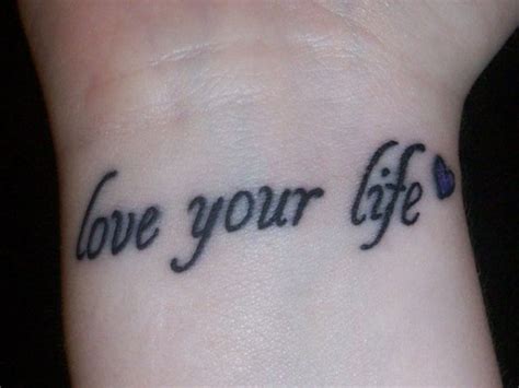 Lovely Love Tattoo On Wrist Tattoo Designs Tattoo Pictures