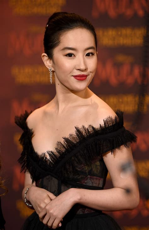 Yifei Liu Wore A Stunning Sheer Black Gown For Mulans Last Premiere