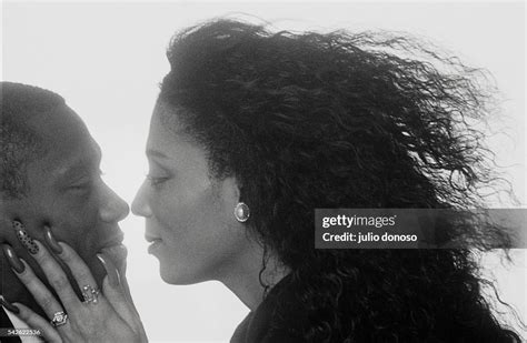 Olympic Runner Florence Griffith Joyner Embraces Her Husband Coach
