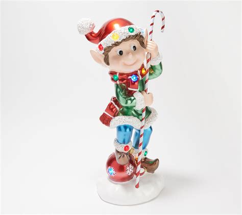 kringle express indoor outdoor illumianted resin elf with candy cane