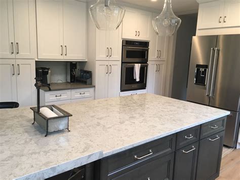 White quartz countertops in the kitchen look great even when white isn't your intended dominant colour for the space. Quartz Countertop Installation featuring Pelican White ...