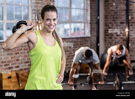 Fit Woman Working Out With Kettlebell Stock Photo Alamy
