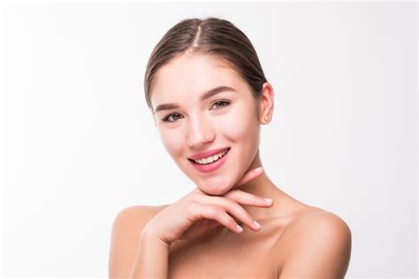 free photo portrait of a beautiful woman with perfect skin on white wall
