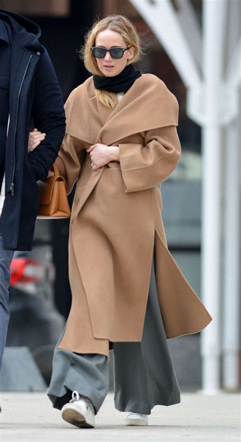 Jennifer Lawrence Wears Totême Camel Coat Instyle