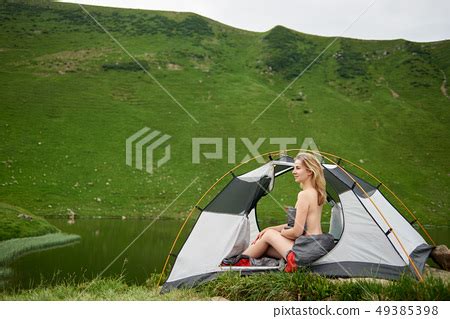 Attractive Naked Woman In Camping Stock Photo Pixta