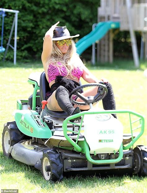 Katie Price Rides Lawnmower In Hot Pink Leopard Print Bikini And