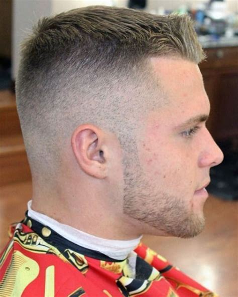 It takes the sides ultra short and leaves just a little bit of length on top, giving you enough to play with and enough to give the illusion of more hair on the head. 20+ High And Tight Haircuts For Men