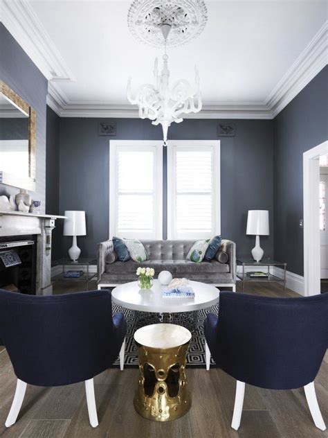 With a monochromatic base of neutrals, shape and texture are important players, and the woven wicker chair and large round coffee table become standout pieces. The 25+ best Navy blue and grey living room ideas on ...
