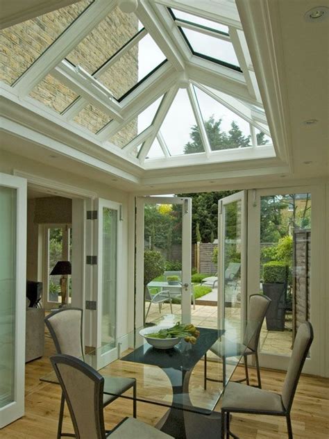 A Roof Lantern Perfectly Defines A Dining Area In An Elegant Orangery