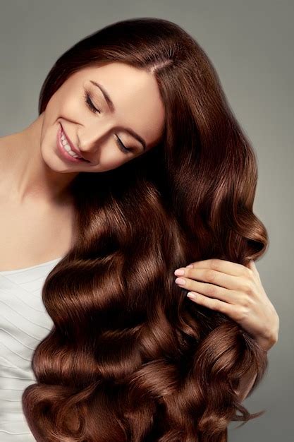 Premium Photo Hair Beautiful Girl With Long Wavy And Shiny Hair