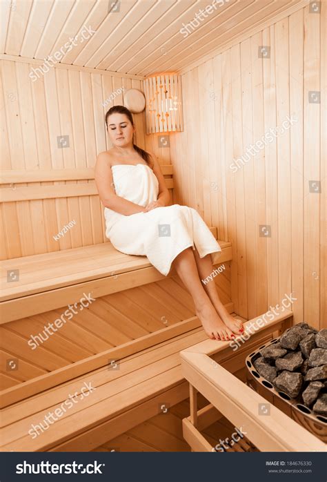 Sexy Brunette Woman Sauna Sitting Closed Stock Photo