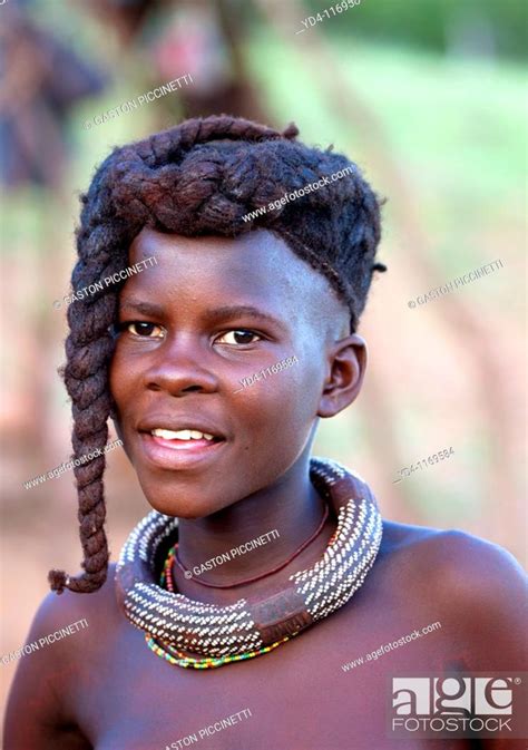 Himba Girl With The Typical Double Plait Hairstyle And Necklace