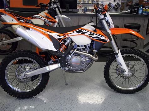 For me, i think the 450xcw is hands down a better all around bike. 2014 KTM 500 XC-W Dirt Bike for sale on 2040-motos