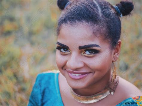 Portrait Of Young Afro American Gypsy Woman In Colorful Blue Stock