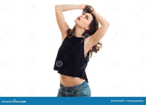 Young Girl Keeps Hands Near The Hair And Lifted Her Head Up Stock Image