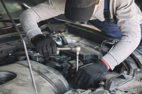 The Mechanic Fixing The Car Stock Image Image Of People Tool 270587207