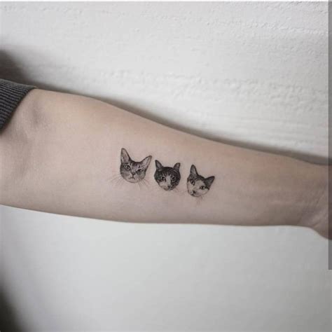 To honor our feline friends, bored panda made a list of the best cat tattoo ideas ever. Tiny Tattoo Idea - Cat Tattoo On Arm... - TattooViral.com ...