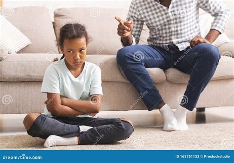 Strict Afro Father Scolding Little Disobedient Daughter For Bad