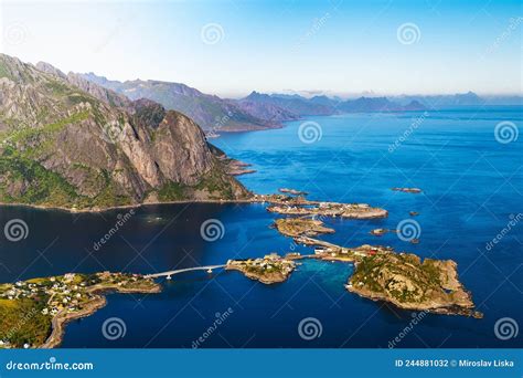 Hamnoy Fishing Village Surrounded By High Mountains And Sea On Lofoten