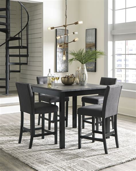Click here to view more. Garvine Counter Height Dining Room Table and Bar Stools ...