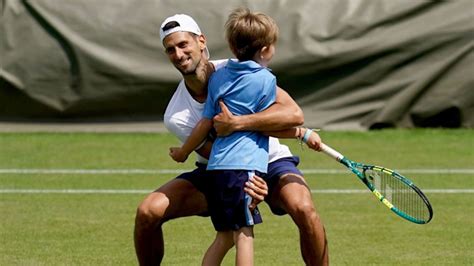 Novak Djokovic Messes Around With Son Stefan On Wimbledon Tennis Court