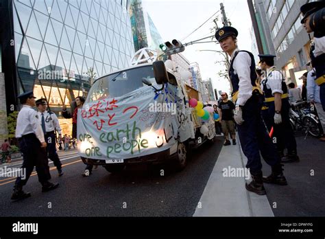 may 03 2009 tokyo japan police officers direct traffic during a demonstration on the