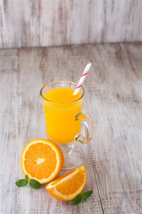 Orange Juice With A Straw In A Glass Stock Photo Image Of Orange