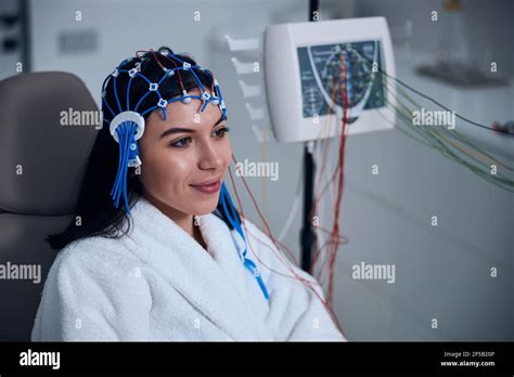 Pleased Female Patient Undergoing An Eeg Test Stock Photo Alamy