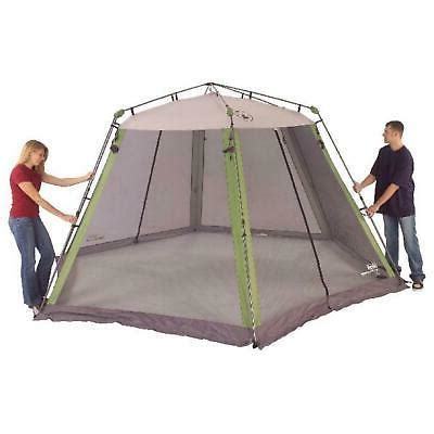 Find protection from the sun, wind and bugs under a coleman® 15 ft. 15x13 Instant Canopy Screen House Shade Tent Beach