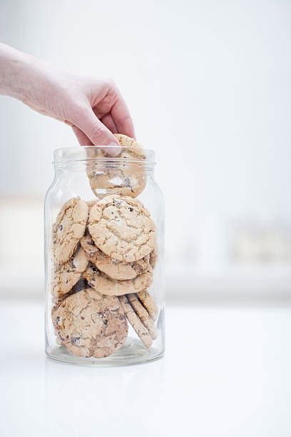 Hand In The Cookie Jar Stock Photos Pictures And Royalty Free Images