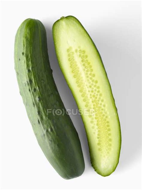Whole And Halved Cucumbers — Close Up Healthy Eating Stock Photo