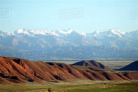 Distant Mountains In Kyrgyzstan - Stock Photo - Dissolve