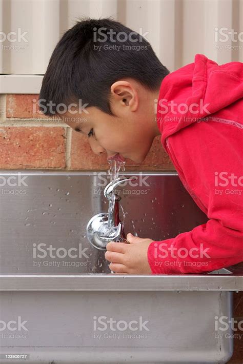 Boy Drinking Water Stock Photo Download Image Now Child Drinking