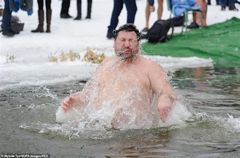 Orthodox Christians Plunge Into Icy Waters For Epiphany Celebration I