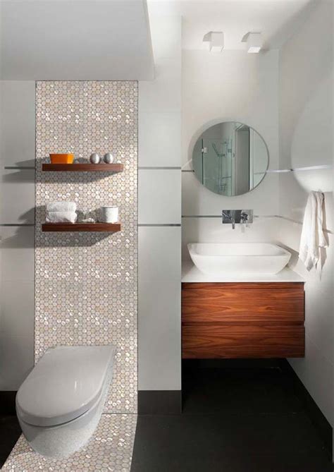 Plain, coloured tiles, either on the floor or on the bathroom walls, will look chic and sophisticated. Mother of Pearl Tiles Penny Round Bathroom Wall Mirror Tile