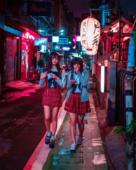 neon nighttime scenes capture the electric energy of taipei after dark in 2023 street