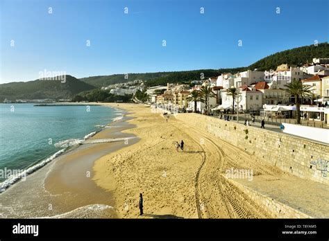 The Coastal Fishing Village Of Sesimbra And The Beach Portugal Stock