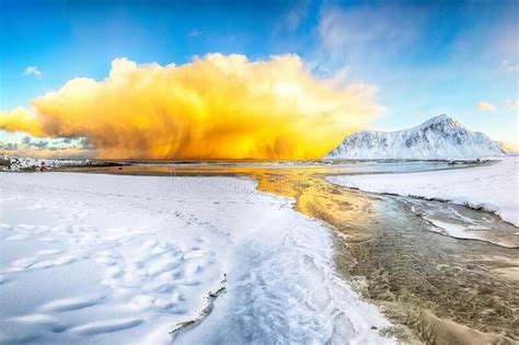 Outstanding Winter Scenery On Skagsanden Beach With Illuminated Clouds