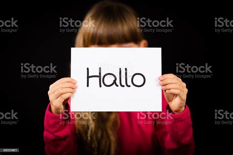 Child Holding Sign With German Word Hallo Stock Photo Download Image