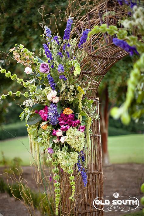 Beautiful Arbor For Outdoor Wedding Bold Colors Texture And Cascade