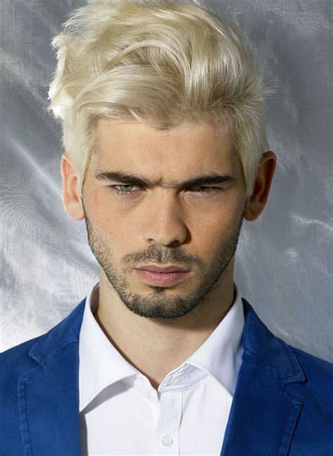 This is one of the trendiest haircuts for black men, particularly young men. Men's look with volume, lifted top hair and a stubble beard