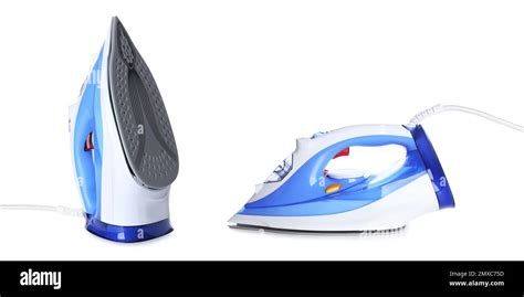 New Modern Electric Irons On White Background Stock Photo Alamy